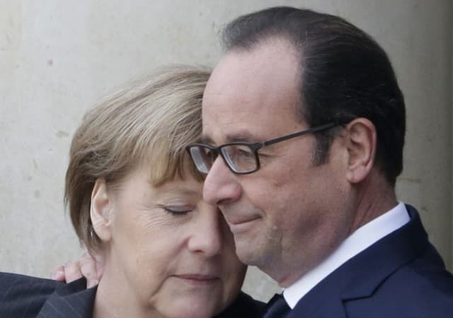 Merkel és Hollande egyetért a kötelező kvóták alapelvében